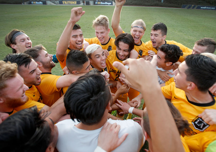 Student soccer atheletes celebrating