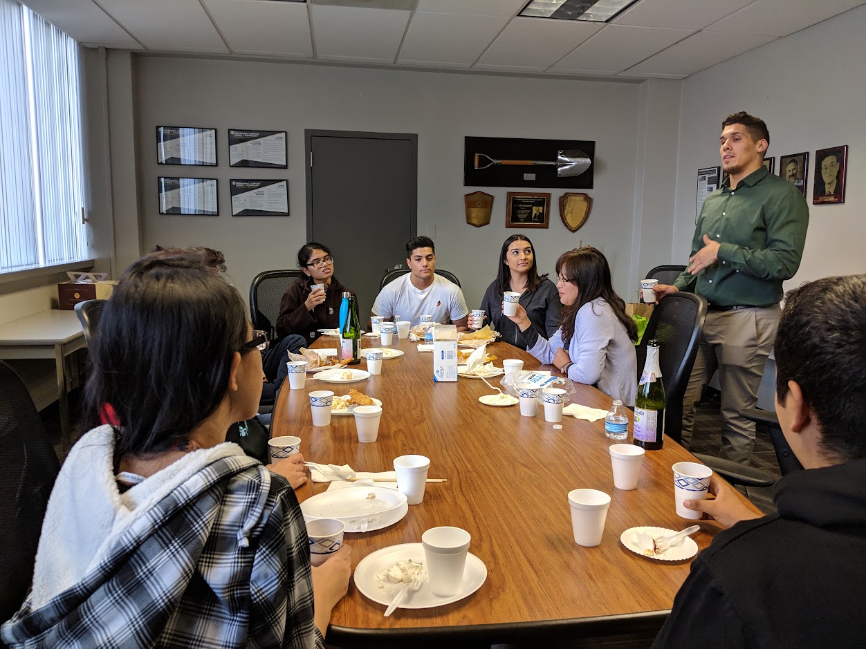 Gerardo Lopez addressing CAPS members at the table
