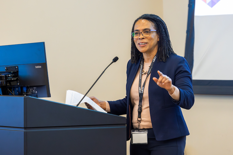 Dr. Krishna Foster delivering the opening remarks