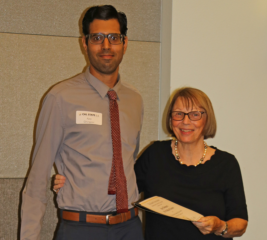 Ajay Ghingoor student, with professor presenting award