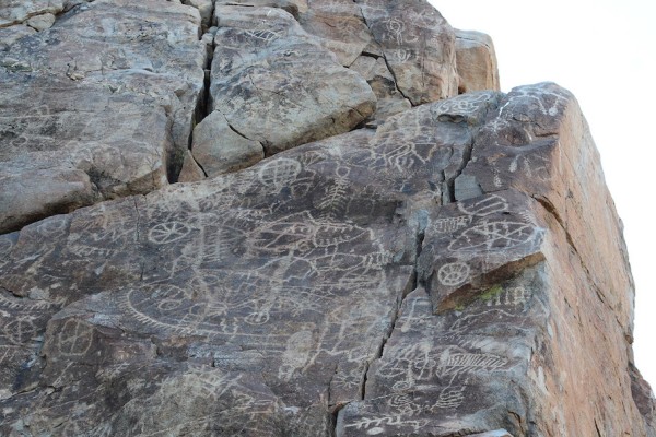 Rock formations with art work carved onto them