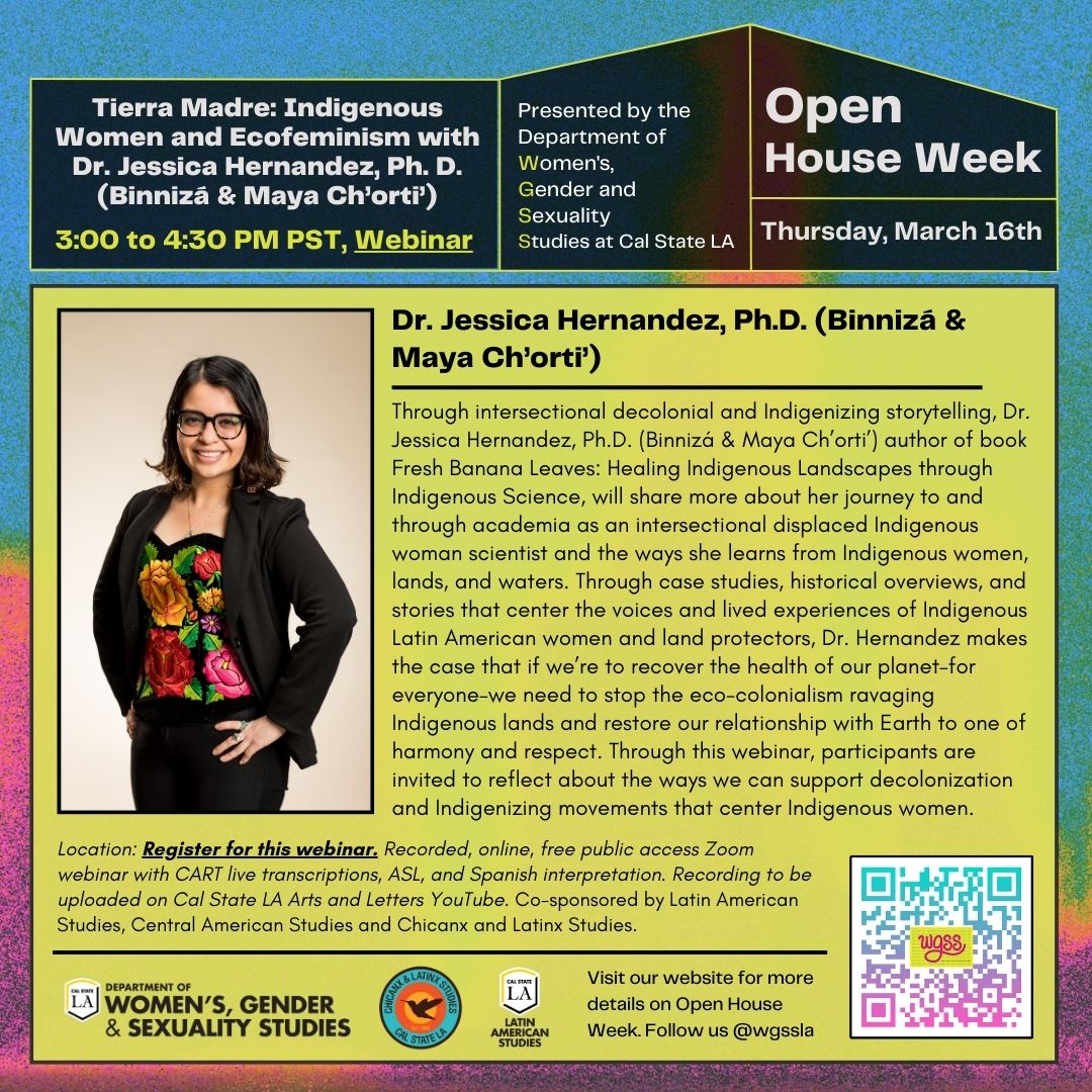 Dr. Jessica Hernandez wearing black frame glasses, magenta earrings, magenta scarf, smiling 
